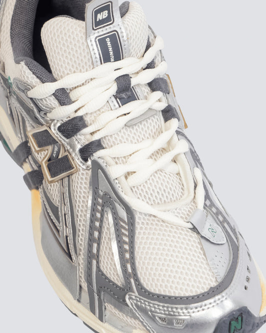 NEW BALANCE 1906A GRIS HOMBRE