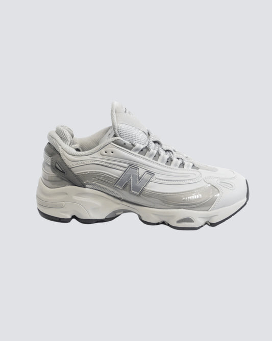 NEW BALANCE 1000 GRIS HOMBRE