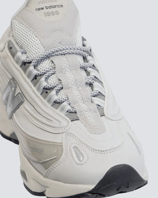 NEW BALANCE 1000 GRIS HOMBRE