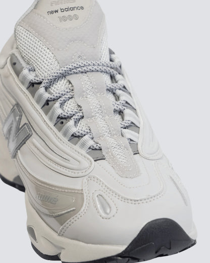NEW BALANCE 1000 GRIS HOMBRE