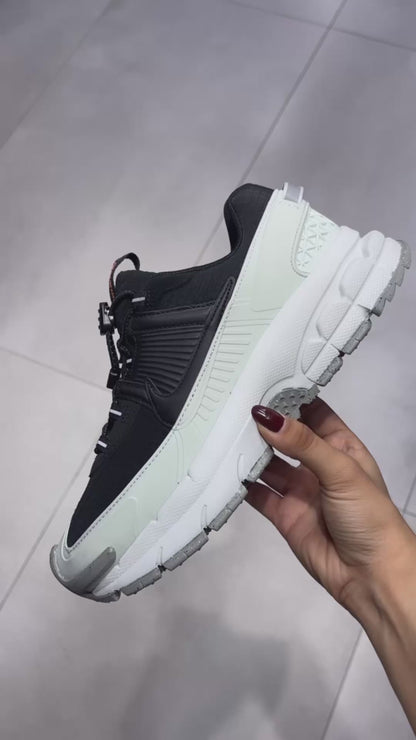 NIKE VOMERO ROAM NEGRO VERDE